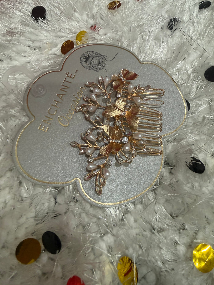 Metal and faux pearl bridal hair comb with crystal rhinestone floral design