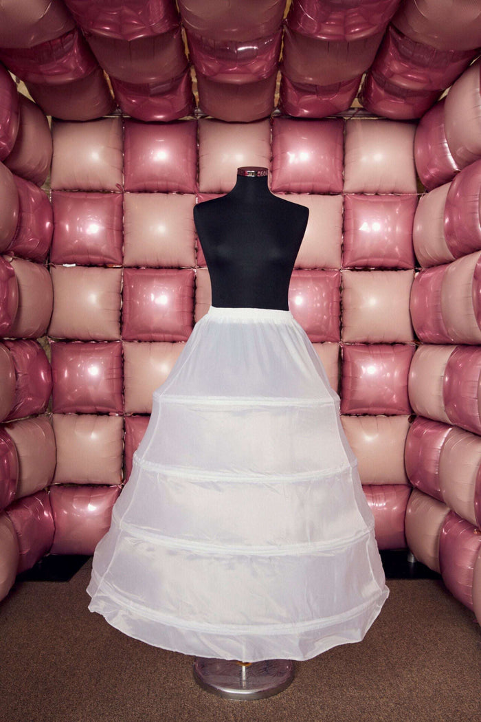 Tiffany's Net Hoop Underskirt for Dresses displayed on mannequin, featuring layered white mesh for volume under bridal gowns or formal skirts.