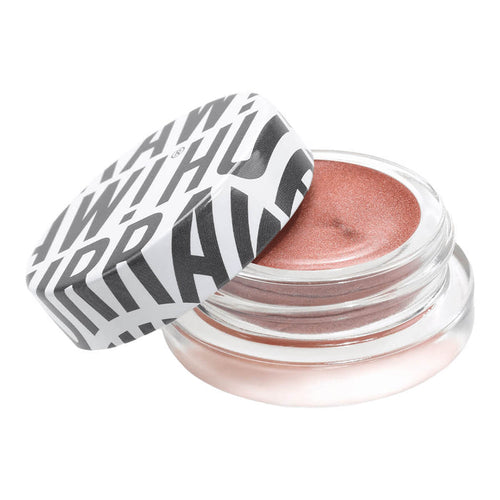 Jar of coconut-based organic shimmer balm.