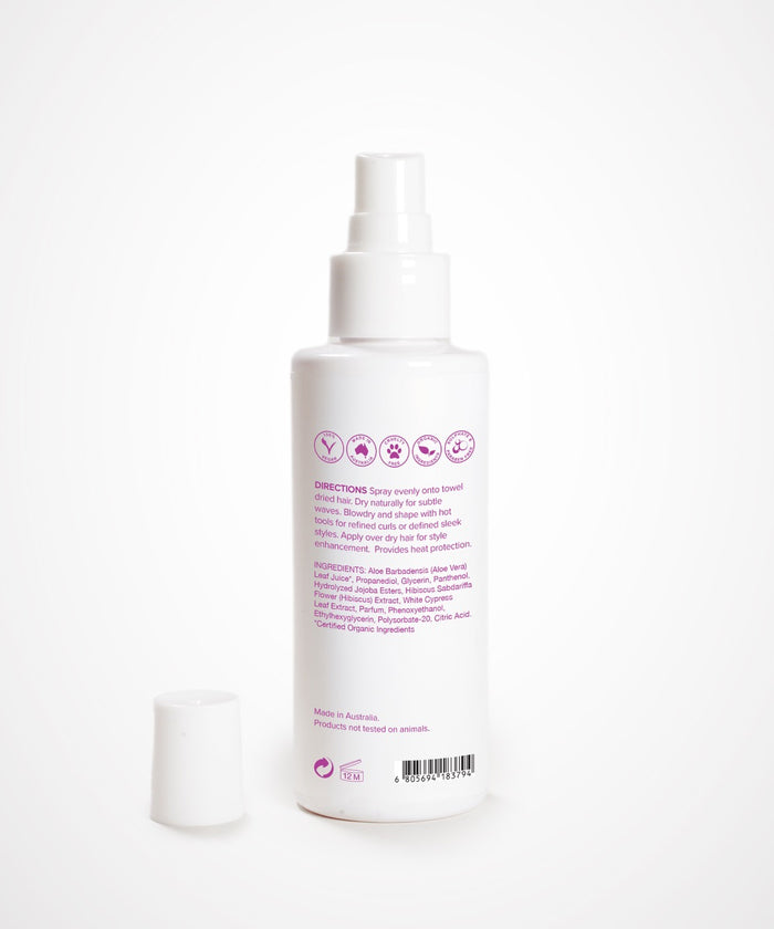 A white Perfect Locks Perfect Heat Protection Spray bottle with a white cap, purple text, and Remy extension icons on white background.