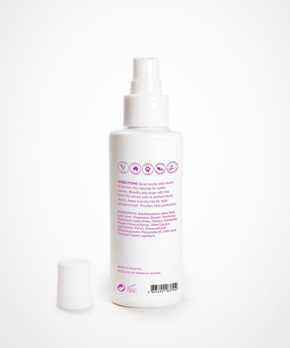A white Perfect Locks Perfect Heat Protection Spray bottle with a white cap, purple text, and Remy extension icons on white background.