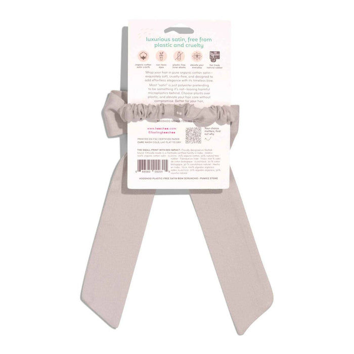 Pumice stone coloured satin bow ribbon with back of packaging on a white background