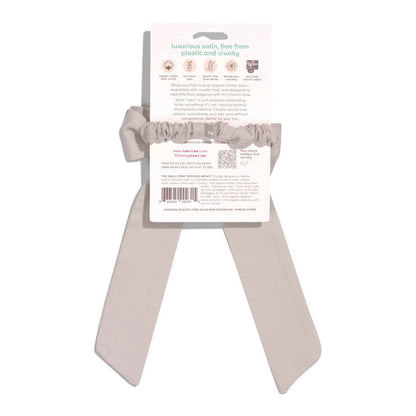 Pumice stone coloured satin bow ribbon with back of packaging on a white background